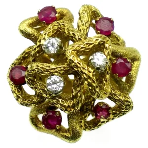 anillo de oro 18 kt roseta rubies naturales y brillantes
